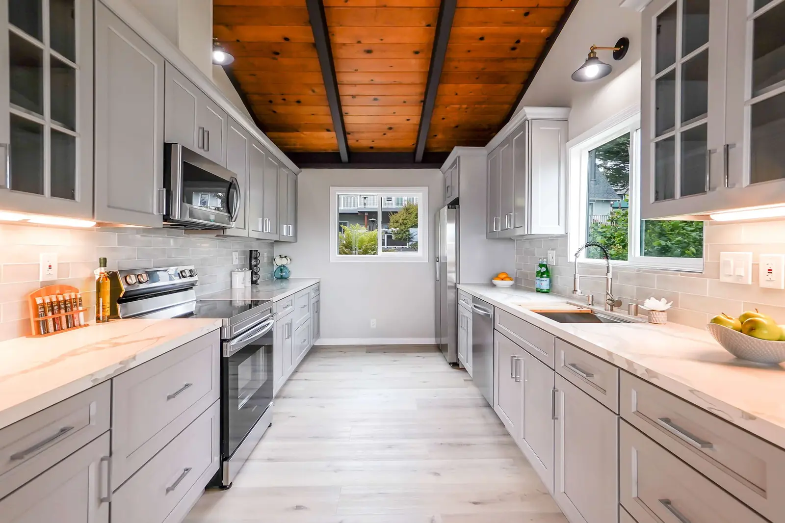 Kitchen island and cabinetry in a completed remodel